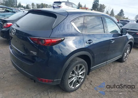 2021 Mazda Cx-5 Signature z USA, uszkodzony, nr VIN JM3KFBEY5M0339156